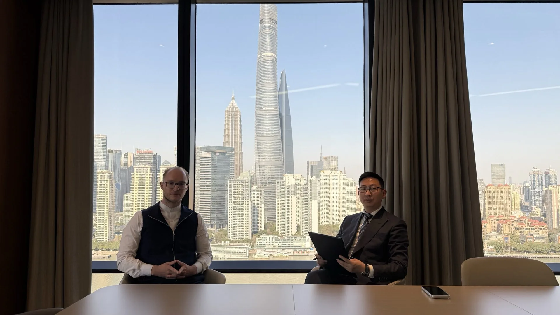 Managing Director (Matti Gerber) and Director (Dean Zhang) in BFC Shanghai sitting in a Interviewer - Interviewee position